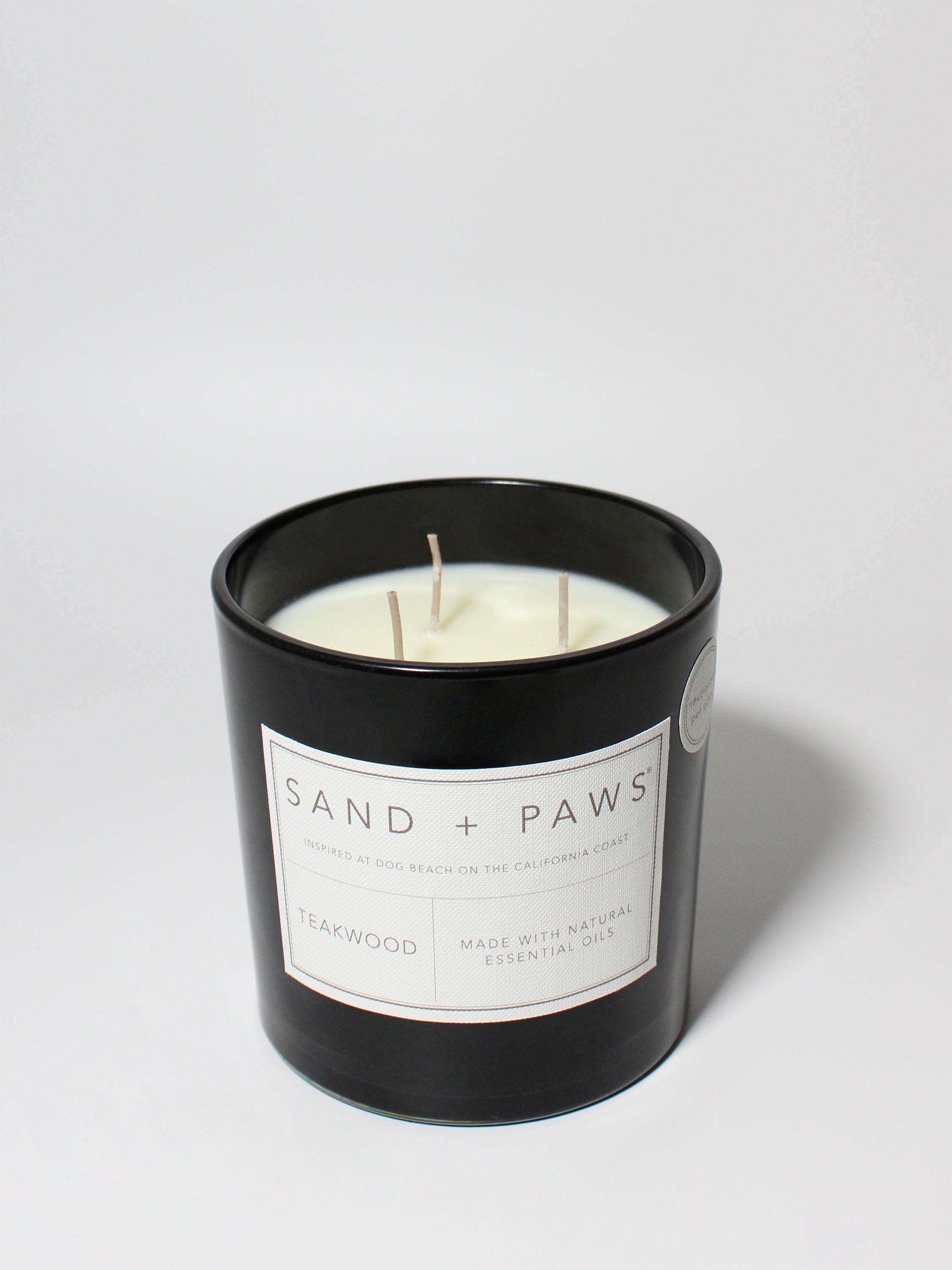 Sand + Paws Teakwood 21 oz scented candle | Shop Sand + Paws