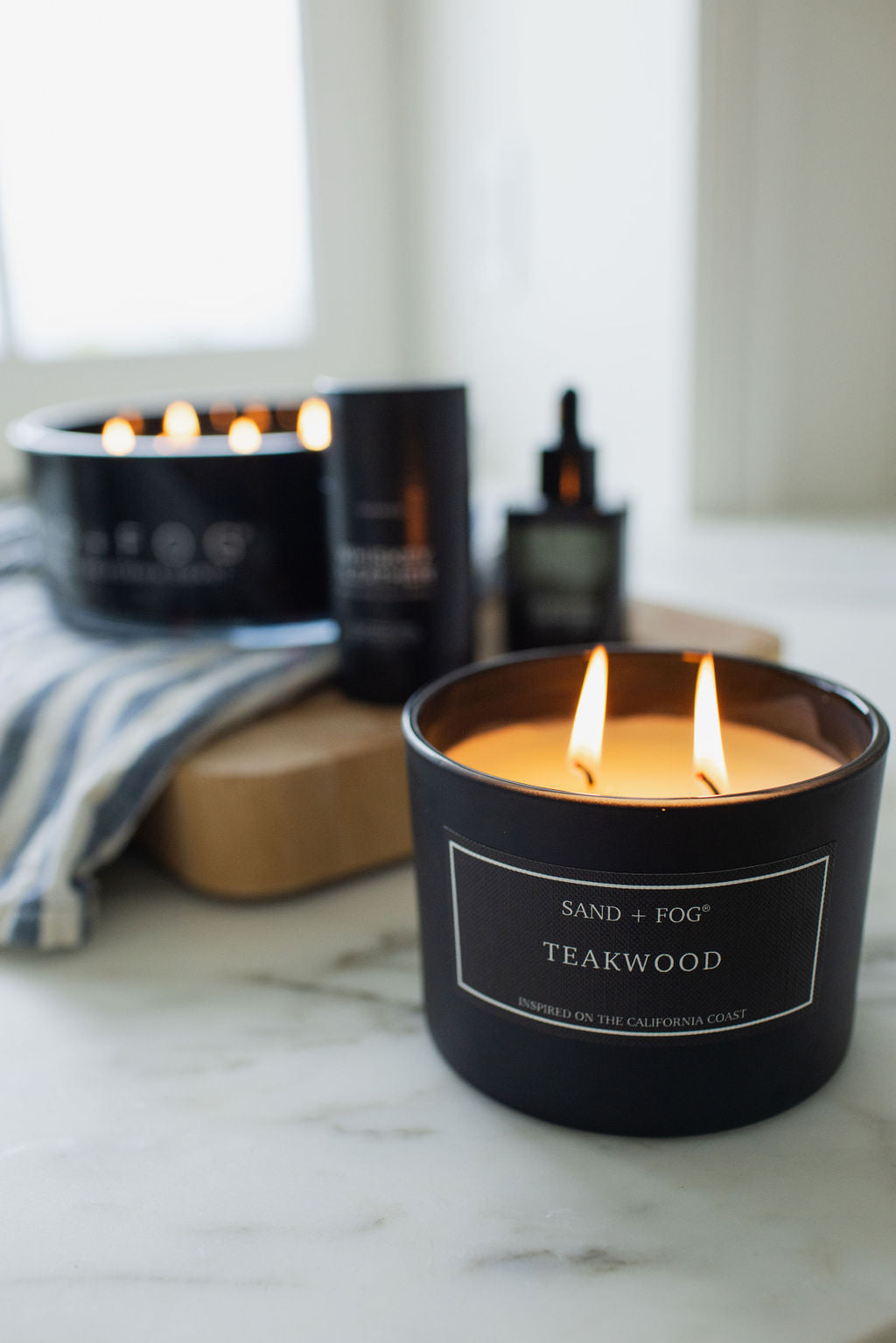 Teakwood 12 oz scented candle | Shop Sand + Fog