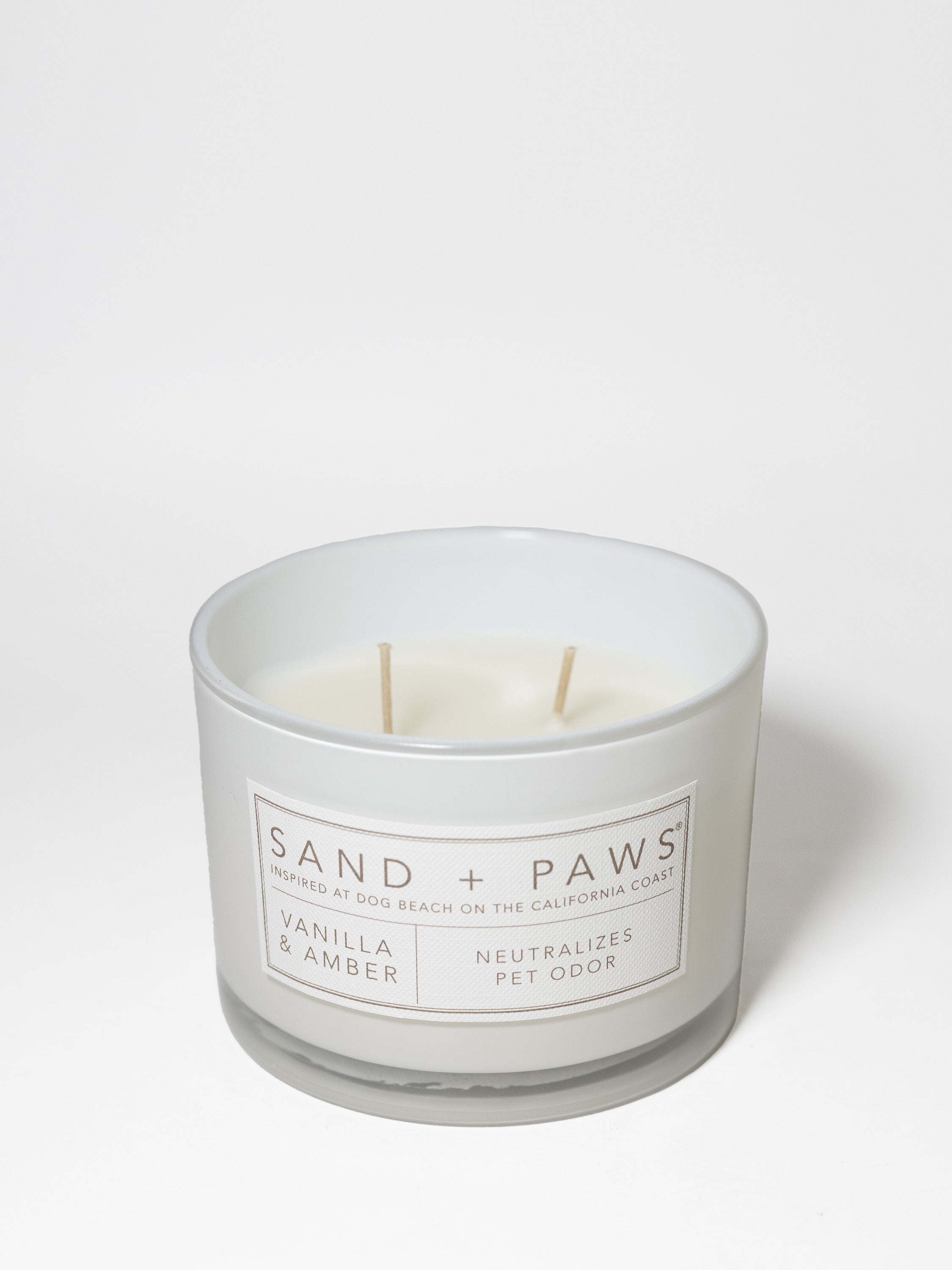 Sand + Paws Vanilla & Amber 12 oz scented candle | Shop Sand + Paws